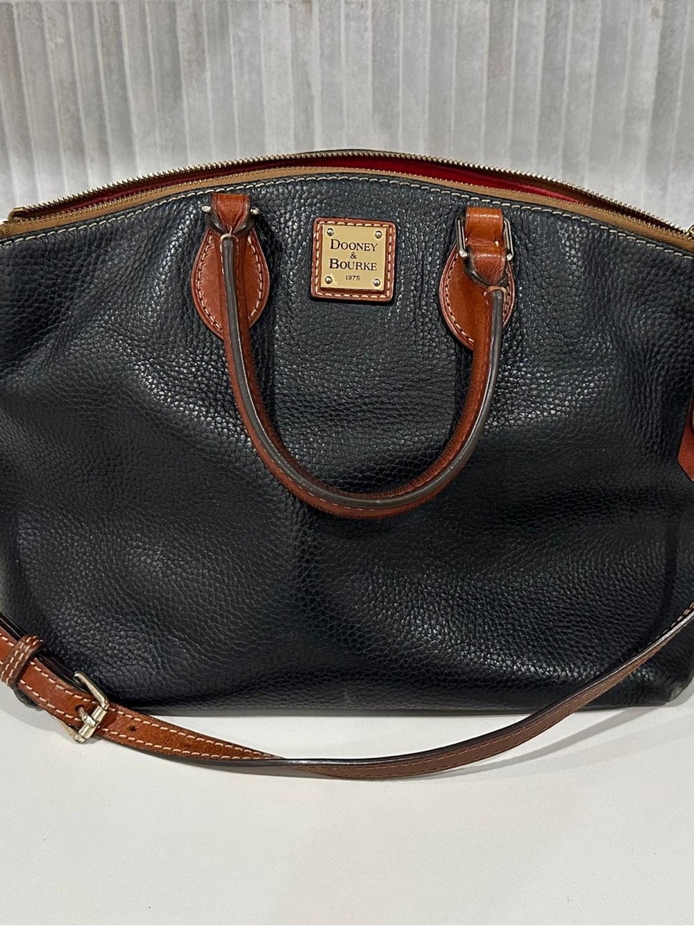 Dooney & Bourke Black Pebbled Leather Satchel with Brown Trim